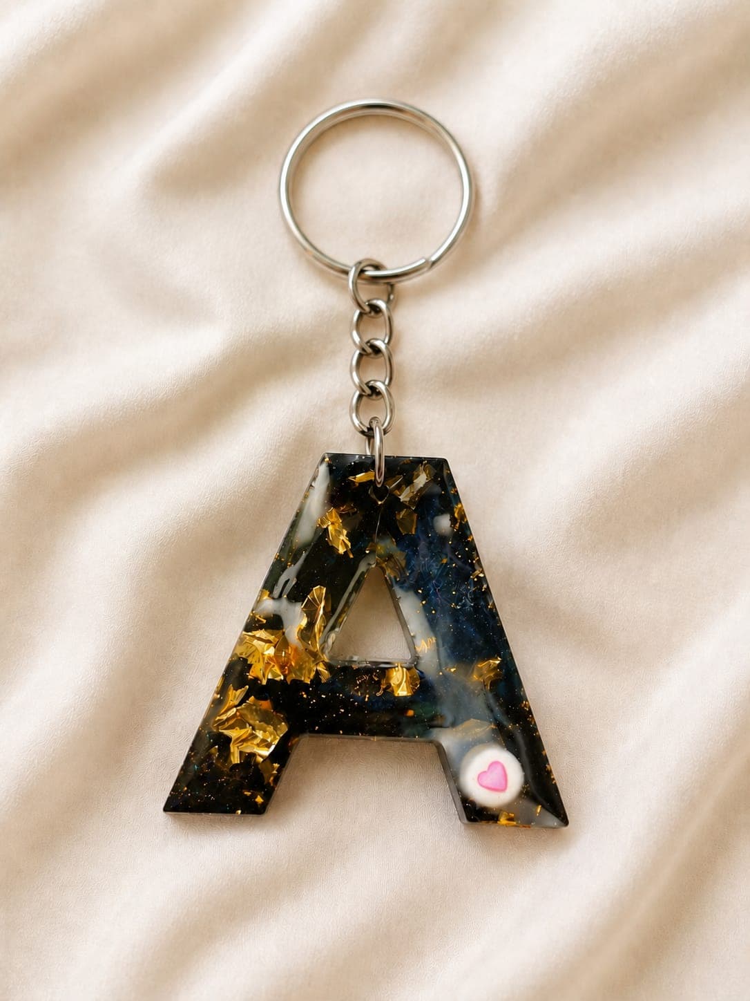 Black and gold personalised resin A keychain